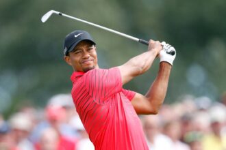 Tiger Woods Faces Fine for Spitting Incident at Dubai Desert Classic