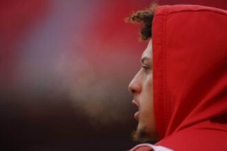 Patrick Mahomes breath shows while warming up prior to playing the Cincinnati Bengals in the AFC Championship